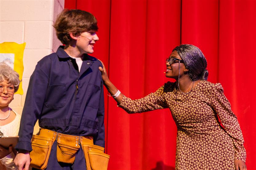 Woodland Middle students perform onstage